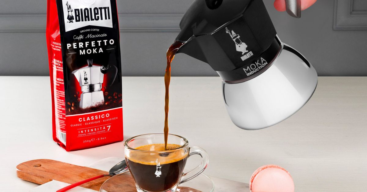 moka pot - Pouring coffee into a cup with a bag of Bialetti beans