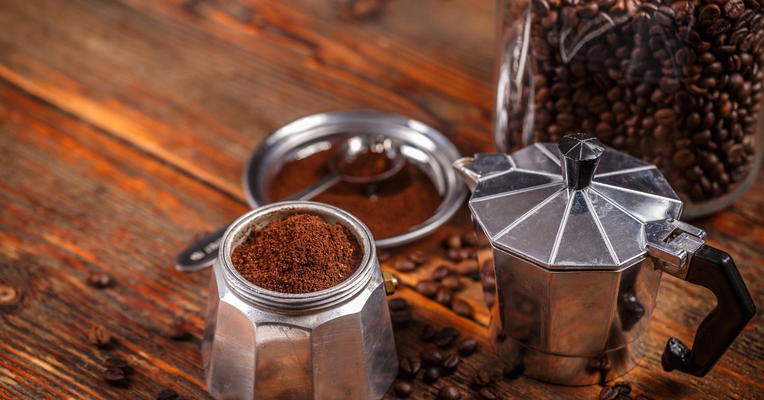 Open Moka Pot showing the coffee grounds