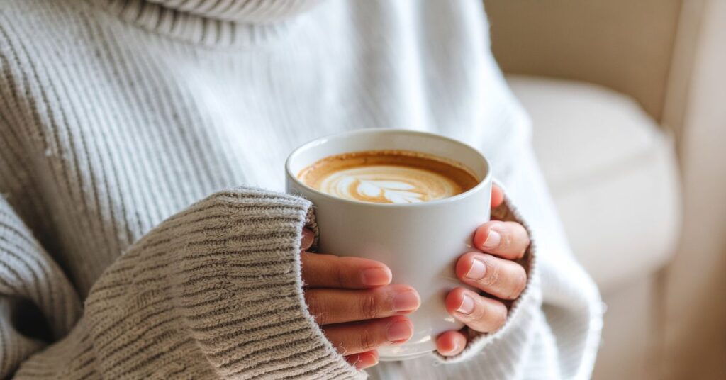 Woman holding cofee