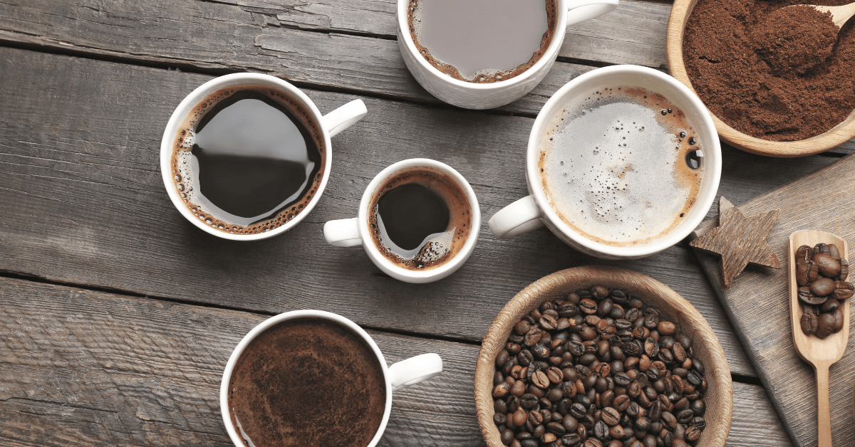 Various cups of coffee on a table