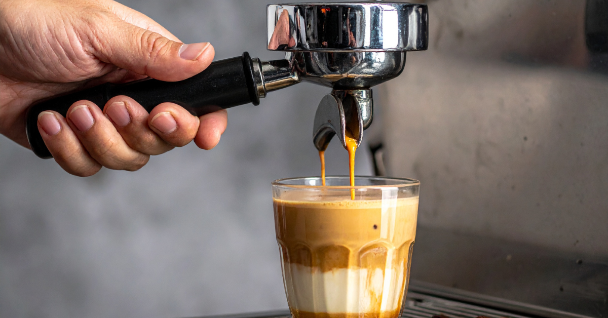 Person making a flat white