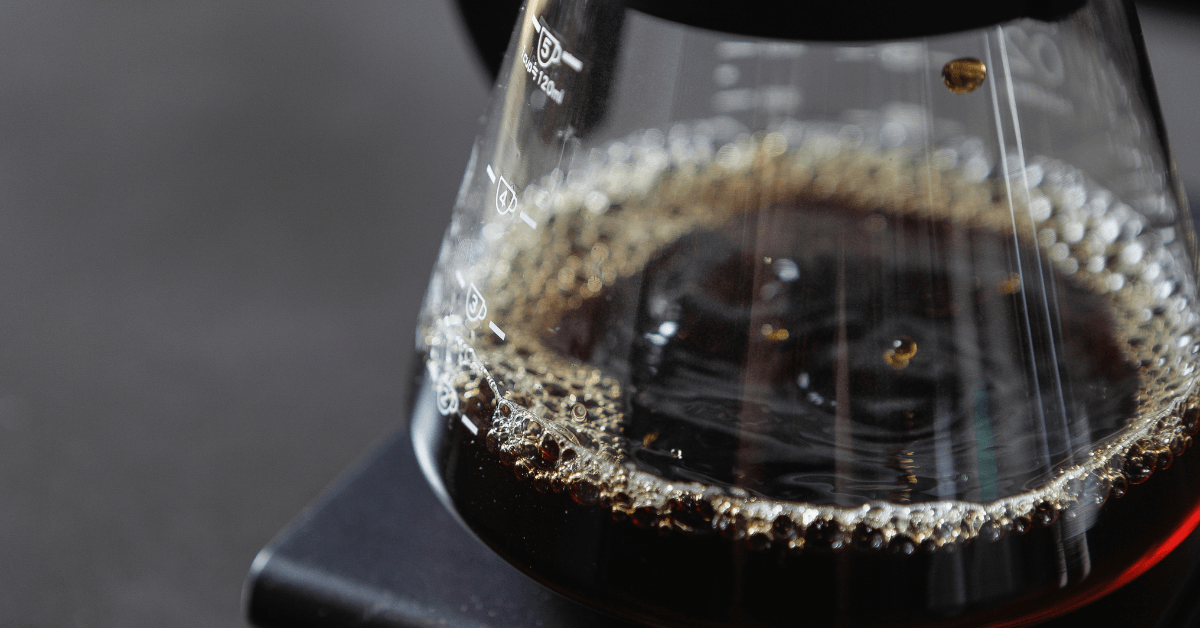 Freshly brewed filter coffee in a glass coffee maker