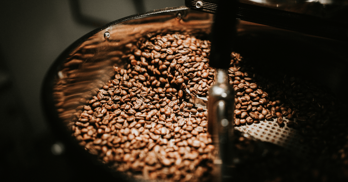 Freshly roasted coffee beans in a coffee roaster