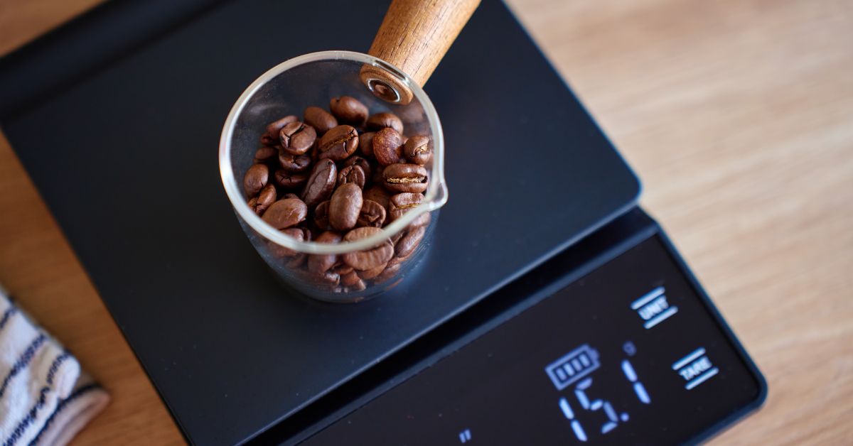 Measuring coffee beans on a scale